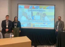 This is a picture of a presentation at the American Evaluation Association's 2023 conference. 