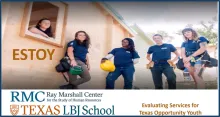 This is an image of young adult workers on a construction site.  There are five women dressed in matching dark blue shirts holding various construction tools and hard hats.