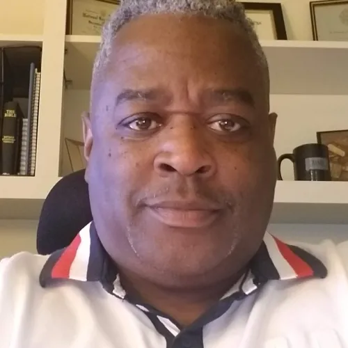 Michael Howell This is an image of Michael Howell, a Systems Administrator at the Ray Marshall Center at the University of Texas at Austin. He has a dark complexion, short gray hair, and is smiling.